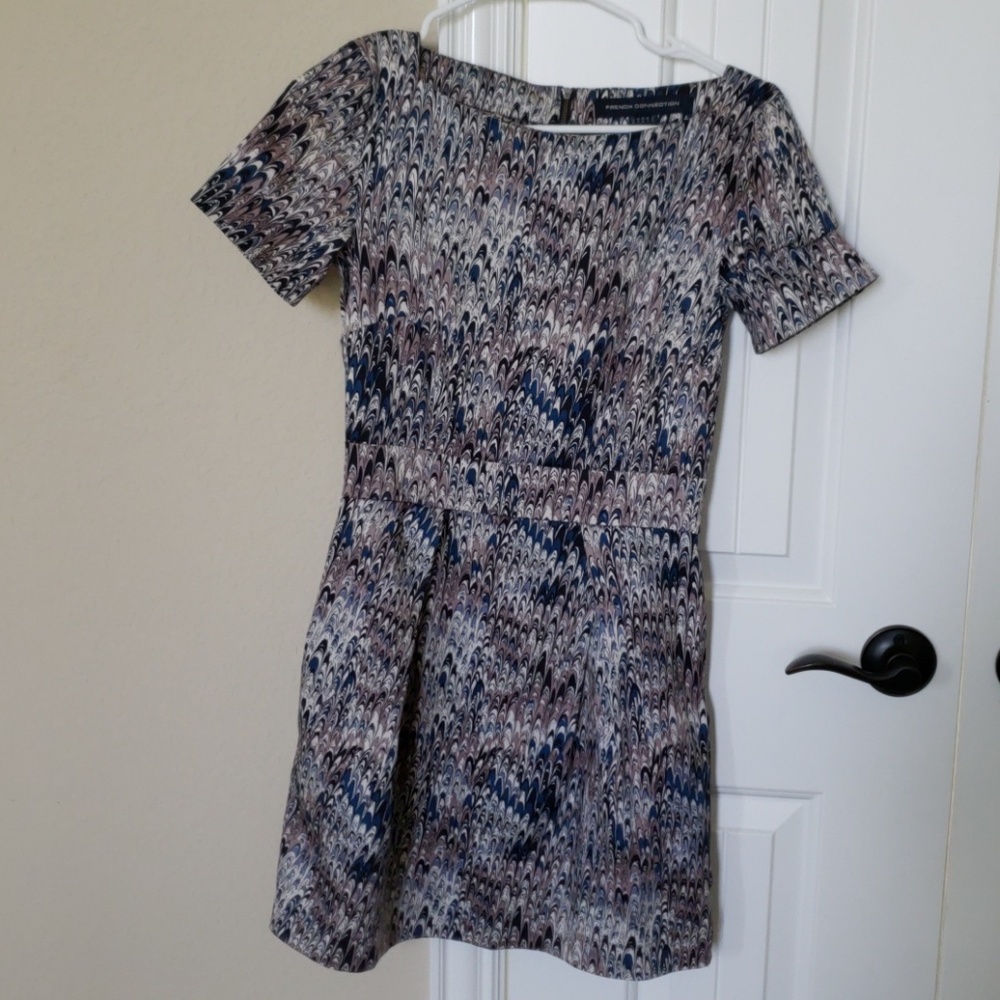 dress with a boat neck and pockets